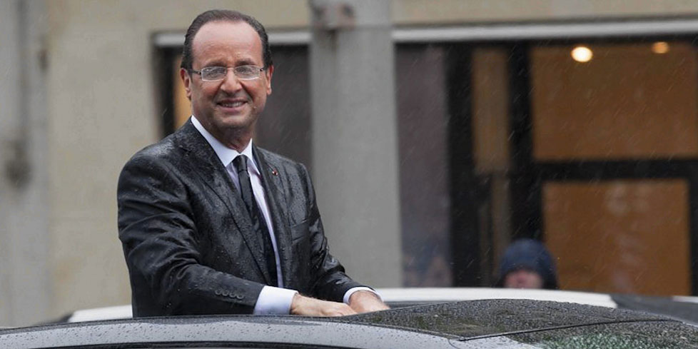 Francois-Hollande-president-de-la-Republique-sous-la-pluie